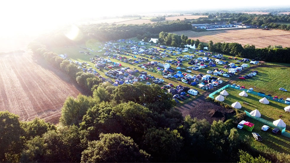 drone shot of paintball festival overhead