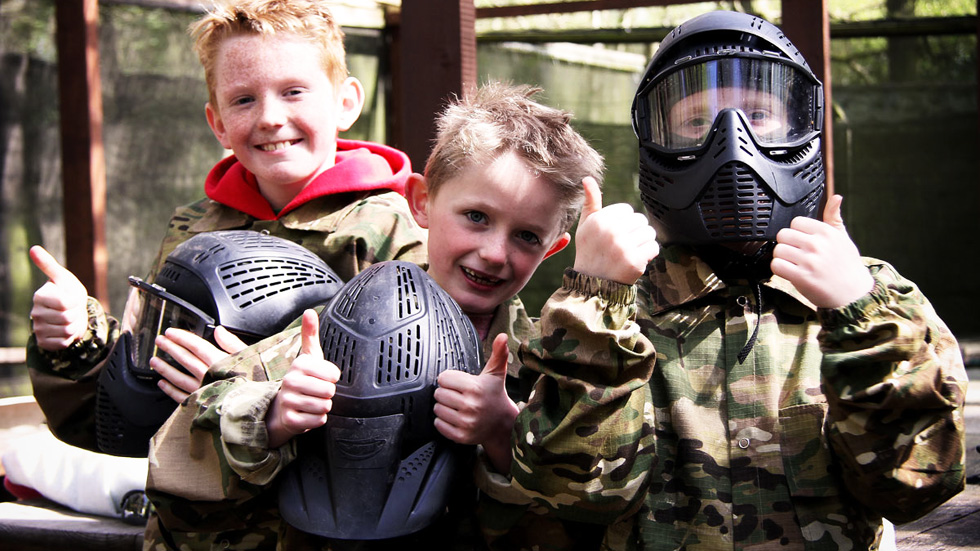 group of happy mini paintballers